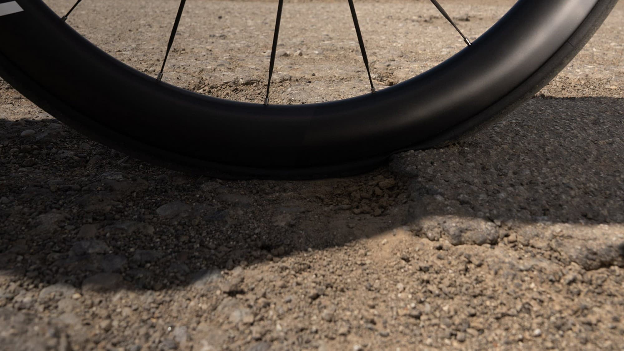 Roval Rapide CLX 3 front wheel rolling over broken tarmac
